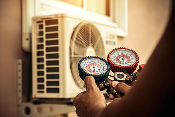 Professional Air Conditioning Service technician working in Foley, AL
